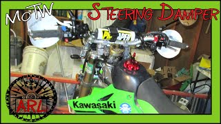 A Guide to Steering Dampers for Dual Sport Motorcycles  MOTW [upl. by Rialcnis]