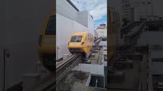 Sentosa Express Hitachi Monorail Yellow departing VivoCity station [upl. by Threlkeld]