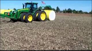 John Deere 8R with Laforge Front hitch moving cotton bales [upl. by Fanny]