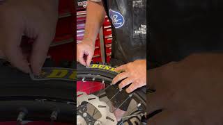 Dunlop Tire Sticker Install motocross dirtbike techtips [upl. by Furlani]