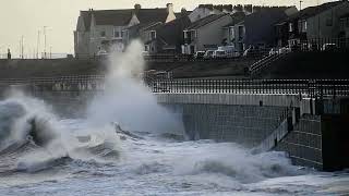 Waves crash against the Headland Promenade in Hartlepool [upl. by Afatsom]