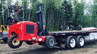 LOADING MOFFETT PIGGYBACK ON FLATBED TRAILER [upl. by Lessirg]