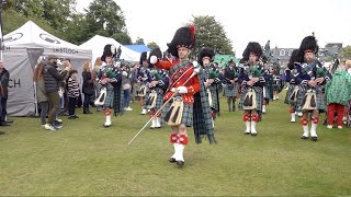 Drum Major Esson leads Ballater Pipe Band playing on the march into 2023 Aboyne Highland Games [upl. by Aicelf]