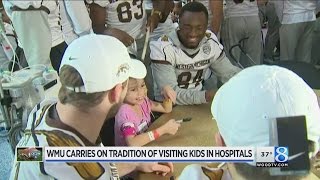 WMU football team visits Children’s Medical Center in Dallas [upl. by Hnamik122]