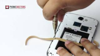 Phone Doctors Tech Tips  How to remove a stripped screw with a rubber band [upl. by Pelson591]