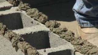 How to Build A Concrete Block Wall [upl. by Nyrahtak]