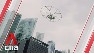 Volocopter air taxi flies over Singapores Marina Bay [upl. by Tallbot]