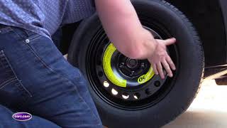 How to Change a Tire A StepbyStep Guide— Carscom [upl. by Roland]