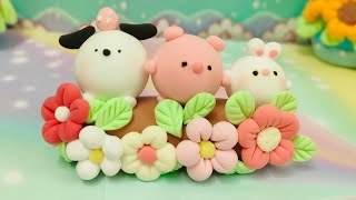 How to make a table decoration with white rabbit pink pig white dog and many flowers [upl. by Theurer704]