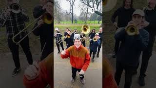 Marching Band Goes Around Giving People Theme Music [upl. by Afatsom]