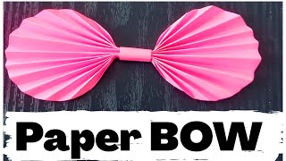 How to make a Bow out of wrappingcolor paper shorts [upl. by Solracesoj]