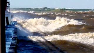 Great Lakes Storm of 2010  Grand Haven channel quotgotchaquot wave [upl. by Skye]