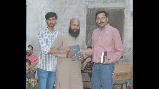 Free Holy Bibles distribution in Khaliq Nagar Lahore city By Evangelist Javed Alam [upl. by Htennaj]