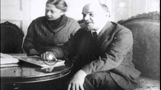 Russian Bolshevik leader Vladimir Lenin at desk with his cat talks with Joseph SHD Stock Footage [upl. by Scrivings]