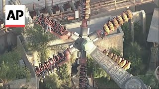 People get stuck midair on a ride at California amusement park [upl. by Ailalue]