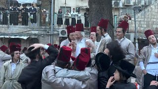 UltraOrthodox Jews celebrate Purim holiday in Jerusalem  AFP [upl. by Tito]