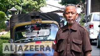 Fears as Indonesia phases out iconic taxi Bemo [upl. by Sirapal416]