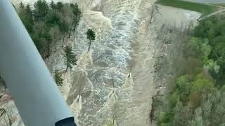 Pilot captures rushing water flowing through failed Edenville Dam [upl. by Mavis]