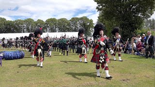 Massed Pipes and Drums opening march for the 2022 Oldmeldrum Sports and Highland Games in Scotland [upl. by Lehcear]