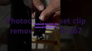 Photocell bracket clip removalgaragedooropenerrepair garagedooropener [upl. by Yenhoj]