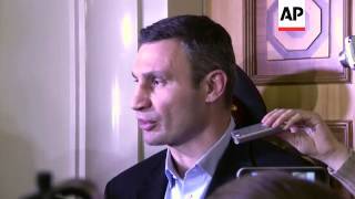 Opposition leader Klitschko and protesters react after PM resigns and govt offers more concessions [upl. by Enimrac]