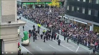 Protesters disrupt Thanksgiving Day Parade in NYC [upl. by Ennovoj]