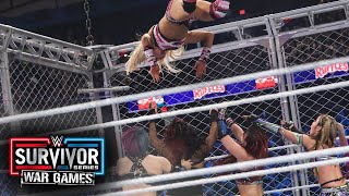 Charlotte Flair hits a moonsault from the top of the cage Survivor Series WarGames 2023 highlights [upl. by Scibert]