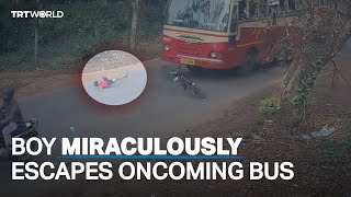 9yearold boy miraculously escapes oncoming bus in India [upl. by Analeh]