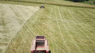 Making round bales on the farm [upl. by Ellenrahs]