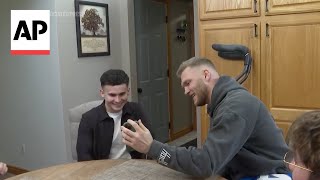 Detroit Lions star Aidan Hutchinson surprises injured Marine with tickets to Thanksgiving game [upl. by Blackmore]