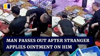 Man passes out after stranger in China applies mysterious ointment on his back [upl. by Abeu]