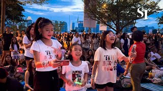 Taylor Swift in Singapore Fans outside the National Stadium sing along with the concert [upl. by Nyberg]