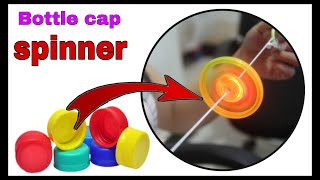 How to make spinning botte caps spinner with bottle caps [upl. by Patricio]