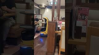 Robot delivering food at Cocos Restaurant in Hiroshima Japan [upl. by Monaco358]