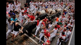 Two injured during third day of running of the bulls in Pamplonas festival [upl. by Aicinoid18]