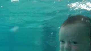 Baby infant swimming under water  4 weeks old [upl. by Nottnerb797]