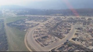 FORT MCMURRAY Helicopter flyover shows scale of fire destruction [upl. by Willtrude]