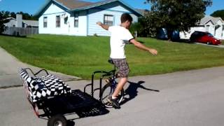 Unicycle pulls trailer [upl. by Justino]