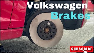 how to change Volkswagen front brake pads and rotors Volkswagen front brakes replacement [upl. by Alix93]