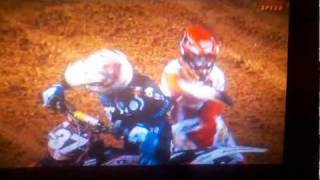 Justin Bogle punches Malcom Stewart  Dallas Texas Supercross 2012 lites main event [upl. by Romonda]