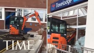 Man Exacts Revenge On A Hotel By Running A Digger Through Lobby  TIME [upl. by Risley]