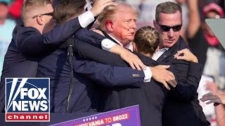 Bloodied Trump rushed off stage after shots fired at rally [upl. by Manfred]