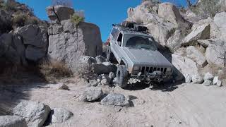 Jeep Cherokee XJ Doing the Squeeze both ways in Anza Borrego Pinyon Mountain Trail [upl. by Ardnayek]