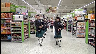 Rare sight as Newtonhill Pipe Band parade through Asda in Portlethen Scotland June 2018 [upl. by Alimat]