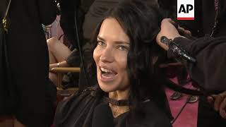 Models get ready backstage at the Victorias Secret fashion show Adriana Lima says she plans to go [upl. by Lidda]