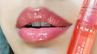 LAMEL All in One Tinted Lip Plumping Oil 401 Peachy  Lip Swatch Video [upl. by Ahsok]