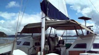 Tangaroa wharram catamaran Motor sailing in the rain [upl. by Norvan]