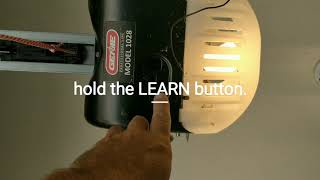 How to program Genie garage door remote Professional Line 1028 [upl. by Costa]