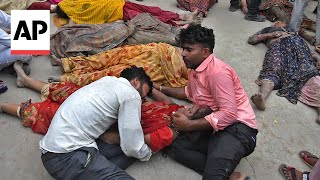 More than 100 dead in stampede at religious gathering in northern India officials say [upl. by Aicekal]