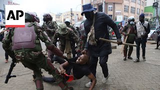 Police hurl tear gas at protesters in Kenya as Cabinet ministers are sworn in [upl. by Anawek877]